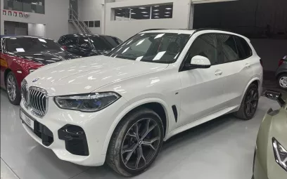 BMW X5 (Белый), 2023 для аренды в Абу-Даби