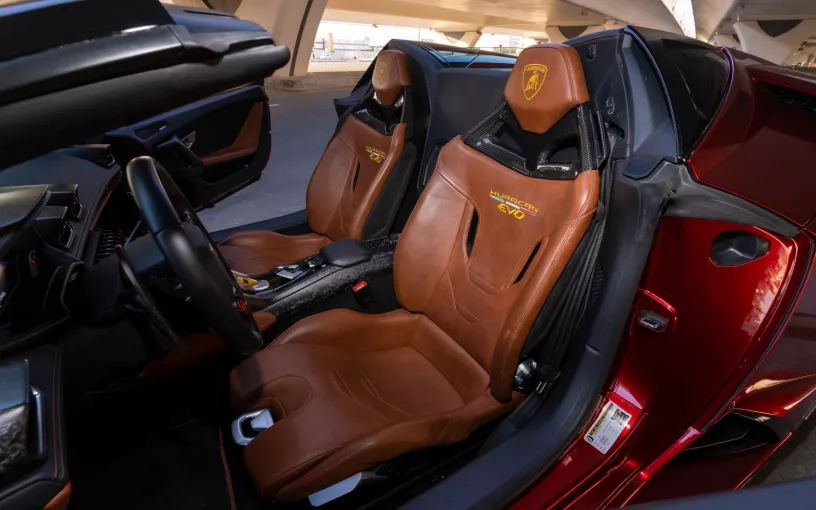 Lamborghini Huracan Evo Spyder (Maroon), 2023 for rent in Dubai